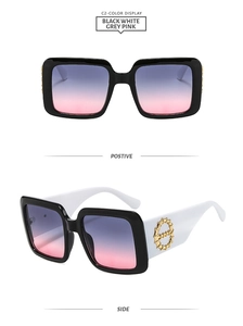 Front and side views of square sunglasses with black frame and white legs and gold detail