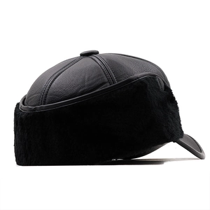 Detail of winter thermal flat cap for men with warm faux fur lining and ear protection
