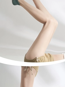 Action shot of cotton yoga socks on feet during an inversion pose for grip and comfort
