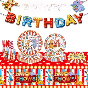 Circus party supplies set with paper plates, cups, and animal themed decorations