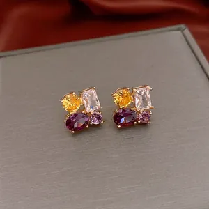 Elegant multi-color zircon stud earrings with oval and rectangular stones in gold setting