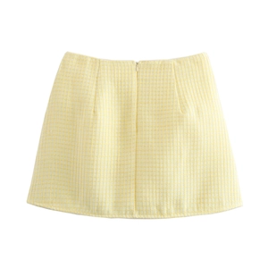Elegante minigonna in tweed a quadretti giallo chiaro con fiore 3D e zip invisibile