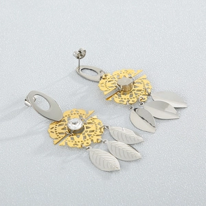 Two-tone mixed metal drop earrings with hollow circles and sparkling leaf-shaped charms