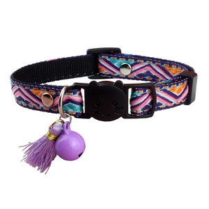 Adjustable purple plaid cat collar with bell and tassel pendant on white background