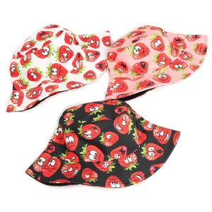Detailed view of bucket hats featuring various cartoon strawberry emoji prints