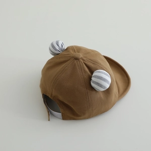 Cute brown baby baseball cap with soft brim and striped bear ears on a white background