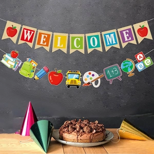Colorful Welcome Back to School banner with classroom icons on a dark grey wall backdrop
