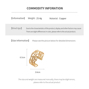 Detailed view of 18K gold plated open cuff bangle showing hollow woven texture and copper material