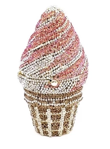 Close-up of luxury ice cream clutch bag with pink and white rhinestones and gold accents