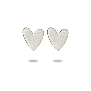 Close-up of white enamel heart stud earrings with minimalist gold metal trim borders