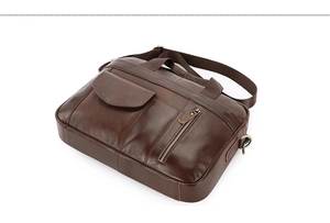 Deep brown leather messenger bag with front flap pocket and adjustable shoulder strap