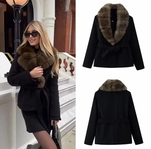 Detail of elegant black waist-tie wool coat with a thick faux fur collar and back view