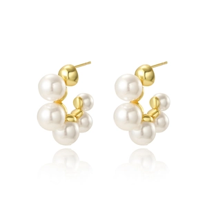 Elegant U-shaped gold hoop earrings with white pearls for women minimalist design