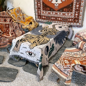 Bohemian cotton throw blanket with winged tiger illustration and decorative fringes