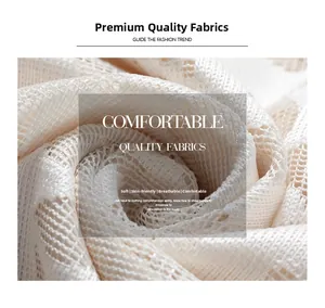 Detail of white mesh lace fabric texture showing soft breathable and skin-friendly quality