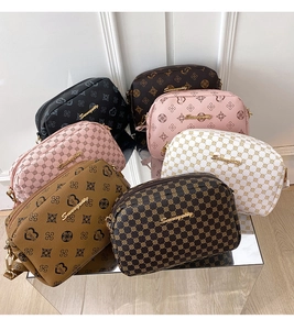 Detailed display of PU leather crossbody bags with monogram patterns in various colors