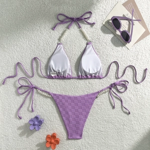Detail of lavender checkered bikini featuring pearl bead straps and side tie bottom