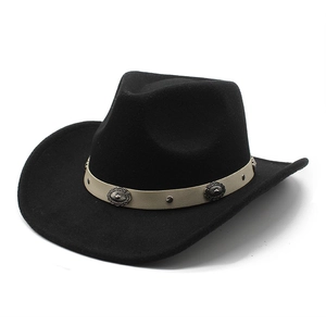 Detail of black wool cowboy hat with vintage silver studs on beige leather band