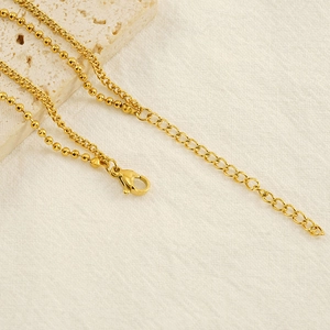 Bracelet double rang en acier titane doré avec pendentif étoile et chaîne à boules