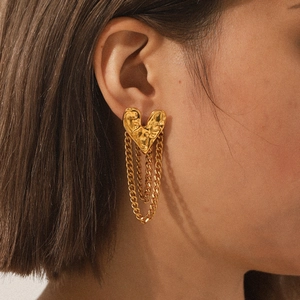 Hammered 18K gold heart stud earrings with triple layer chain tassels on model