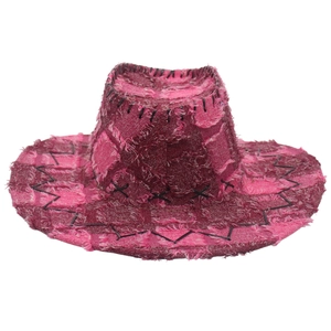 Detailed view of pink patchwork denim cowboy hat with frayed edges and cross stitching
