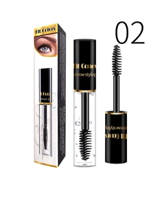 Macro shot of waterproof eyebrow styling gel tube, spiral brush wand and product box