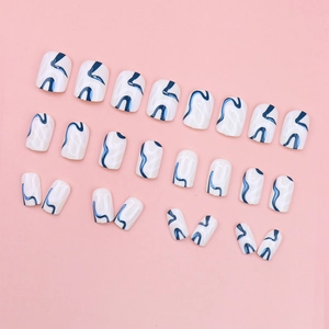 Blue and white minimalist wavy line press-on nails set with 24 abstract nail pieces
