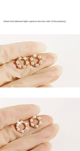 Detail shot of mini pearl and zircon wreath earrings with golden metal finish