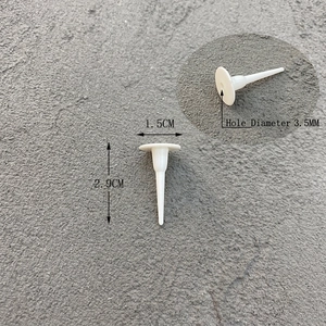 White plastic cake topper base adapter pins 1.5cm wide and 2.9cm long with 3.5mm hole