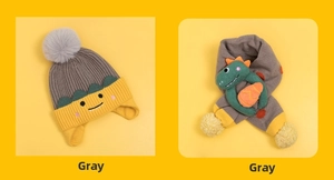 Detail of grey knitted hat with dinosaur embroidery and matching scarf for kids