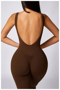Deep brown backless yoga bodysuit featuring scrunch butt lifting and flared leg details