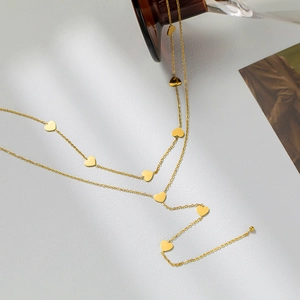 Elegant gold double-layered Y-shaped titanium steel necklace with heart and clover charms