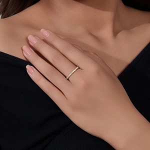 Close-up of a gold-plated sterling silver ring set with micro-pave cubic zirconia crystals