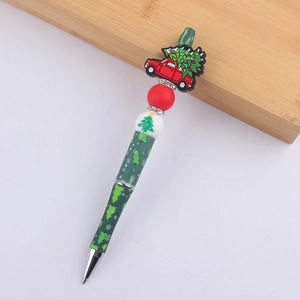 Detail of Christmas beaded pen with cartoon red car and silicone tree ornament