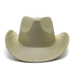 Detailed close-up of golden glitter western cowboy hat with a sparkling textured finish