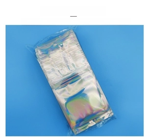 Close-up of holographic resealable jewelry bags for small accessories in 100pcs pack