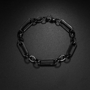 Retro black stainless steel paperclip chain bracelet with lobster clasp on dark background