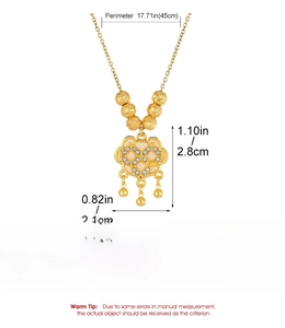 Detail of gold alloy lock pendant with micro-inlaid diamonds and tassel beads