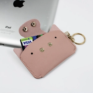 Pink cartoon PU leather card wallet with golden keychain and dual button closure