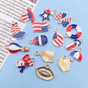 Close-up of 15 alloy enamel charms featuring American flag patterns and hat shapes