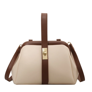 Retro two-tone handbag in beige and brown with golden clasp and adjustable strap