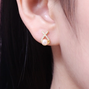 Elegant S925 silver natural freshwater pearl earrings with gold crossover zircon design