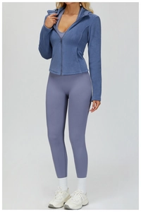 Detail of slim-fit hooded jacket with zipper and warm fleece lining for outdoor sports