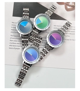 Detail shot of four minimalist steel watches with creative color-gradient dials in one frame