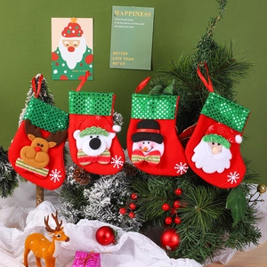 Set of 4 Christmas stockings with 3D reindeer and Santa designs for holiday tree decor
