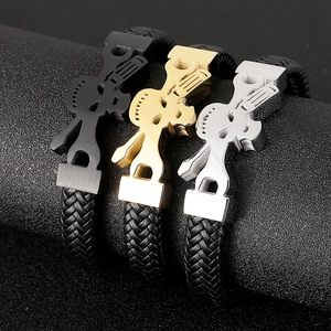 Braided leather guitar bracelets in black, gold, and silver finishes for rock music fans