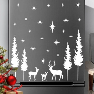 White Christmas reindeer and pine tree wall decals on black modern surface