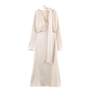 Elegant champagne satin long sleeve dress with V-neckline and neck scarf tie detail