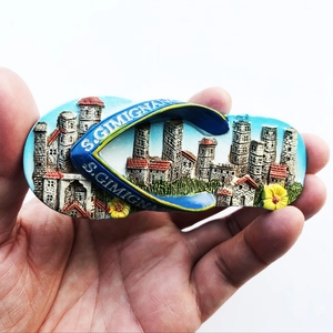 Detailed resin flip-flop magnet featuring colorful San Gimignano tower relief artwork