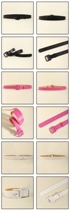 Detail view of colorful leather belts with square covered buckles in black, rose and white